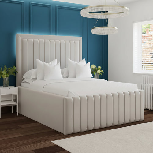Neatly made bed with white bedding in a bedroom setting.