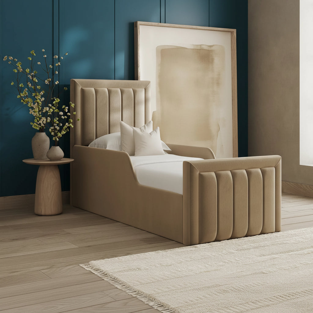 Beige upholstered bed in a room with a large abstract painting and a window.
