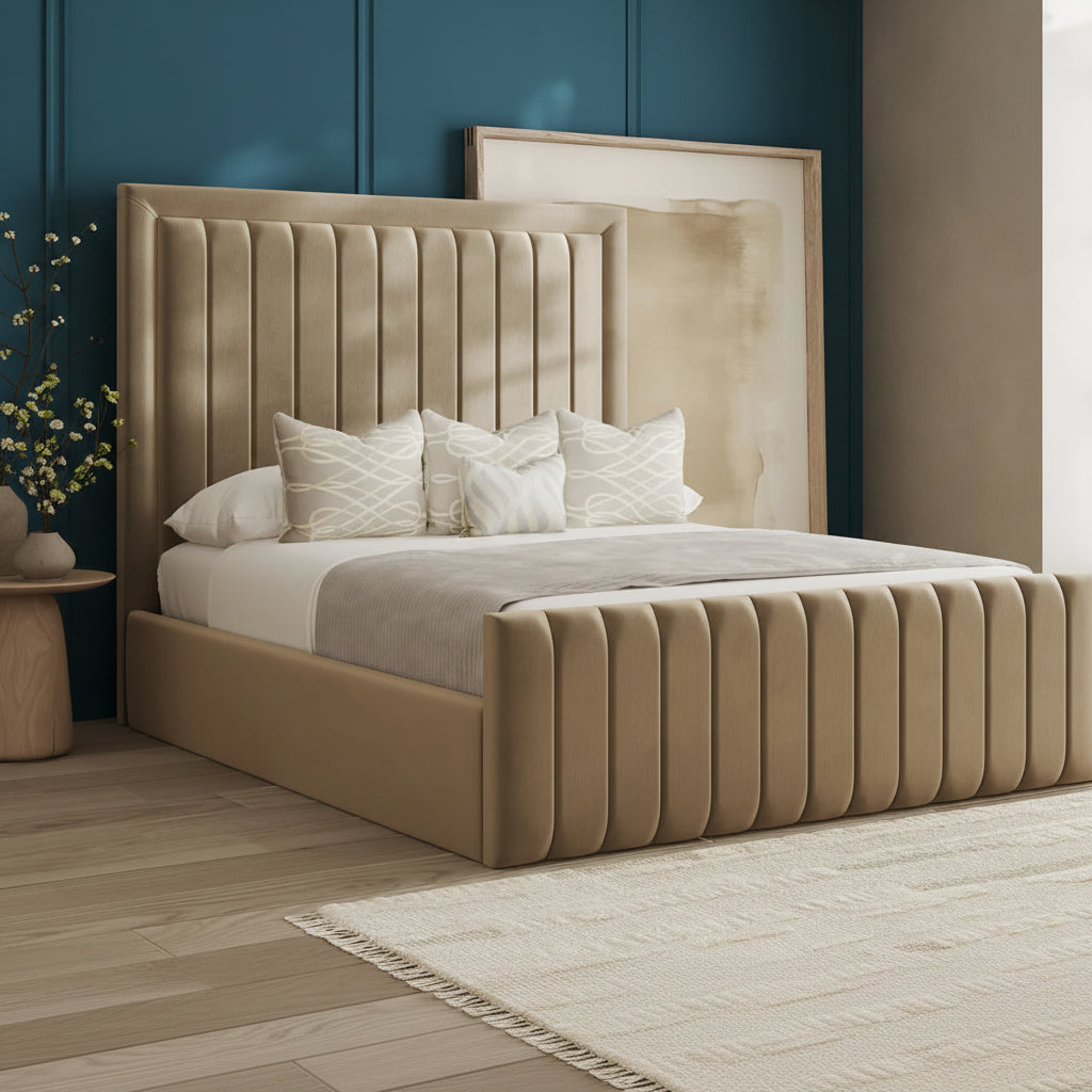 Beige upholstered bed with pillows in a bedroom setting
