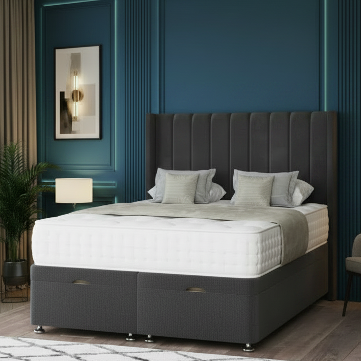 Modern bedroom with a gray upholstered bed, white bedding, and decorative elements.