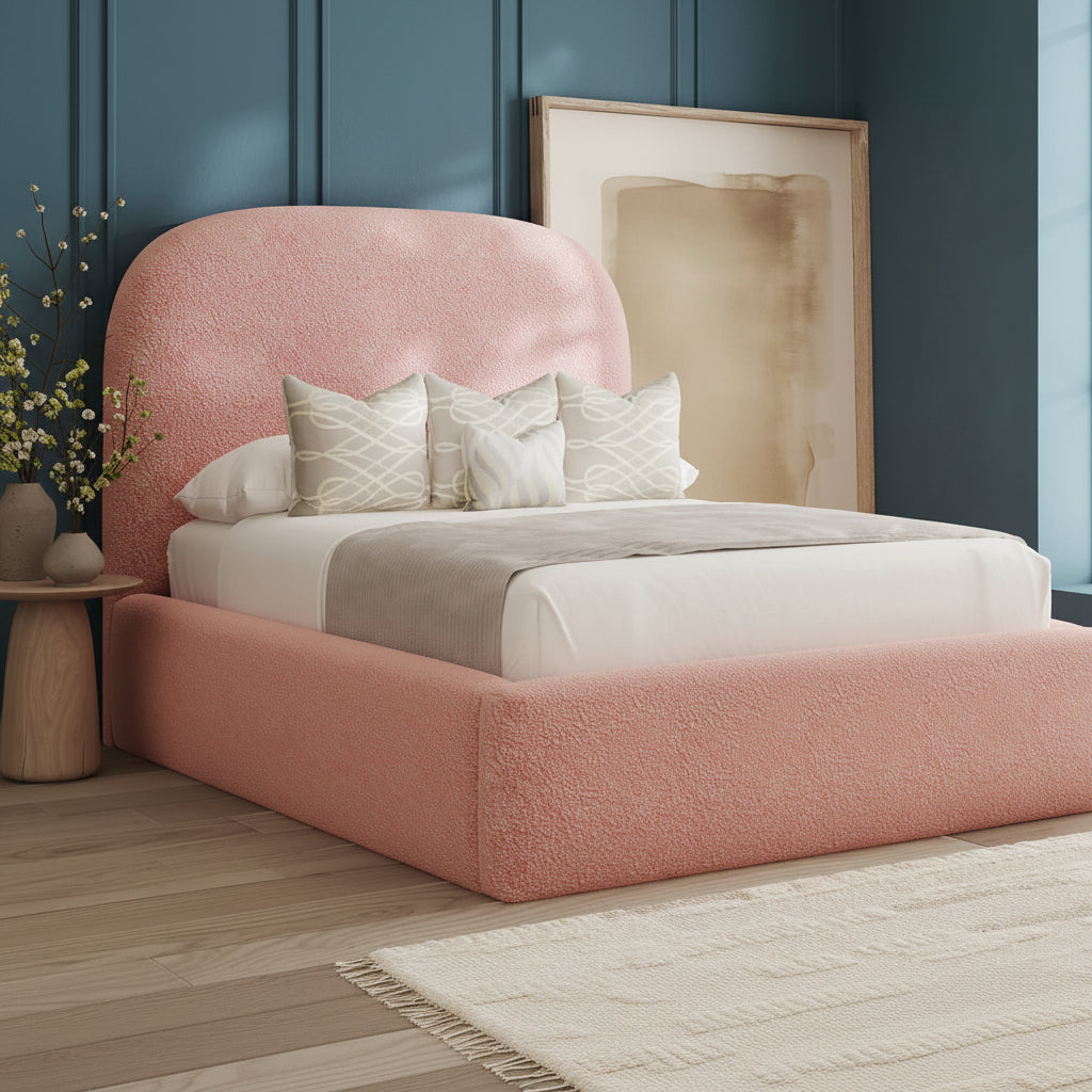 Pink upholstered bed with white bedding in a bedroom setting