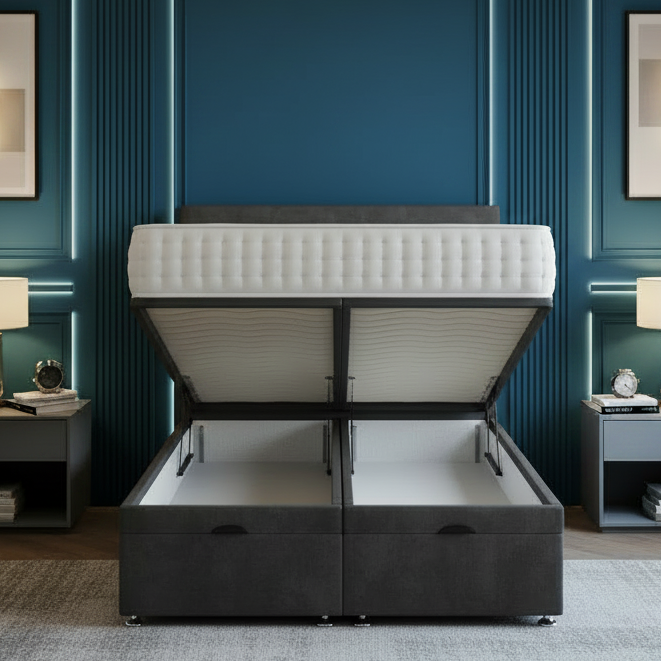 Modern bedroom with a bed that has storage drawers, decorative lighting, and artwork on the walls.