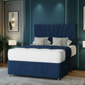 Modern bedroom with a tufted bed, gray walls, and decorative lighting.