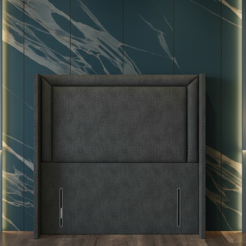 Dark gray upholstered headboard against a decorative wall with abstract patterns.