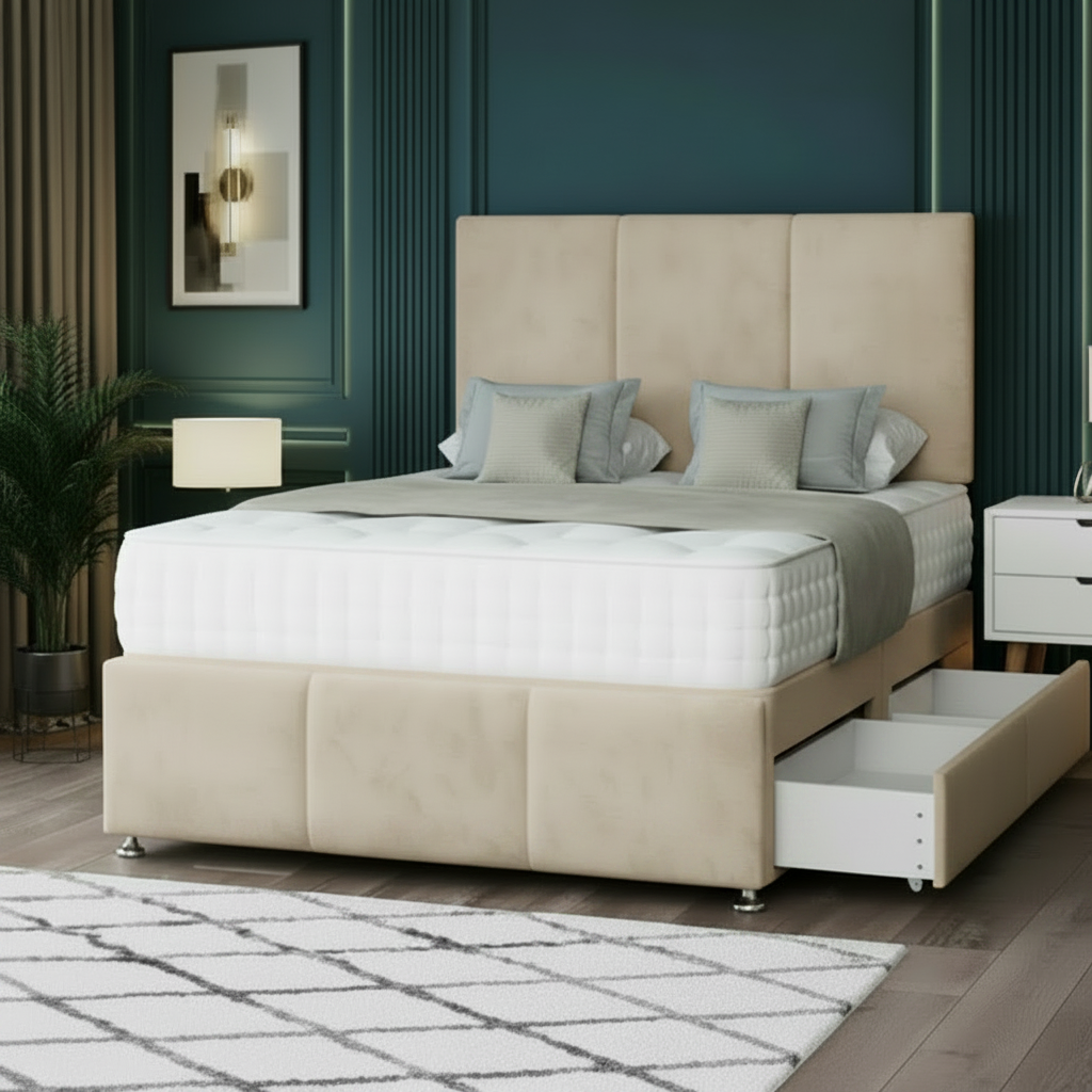 White upholstered bed with storage drawers in a bedroom setting.