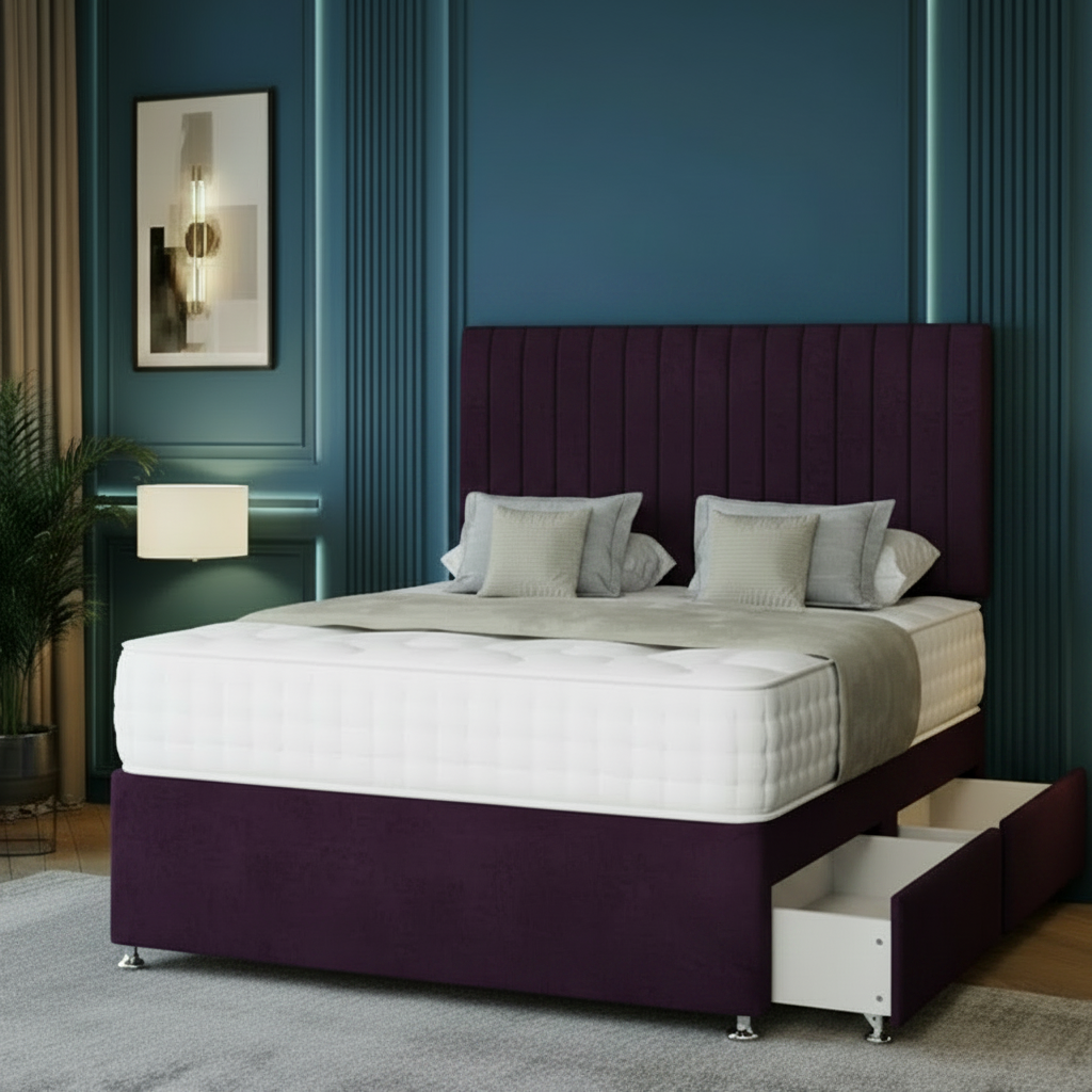 Beige upholstered bed with storage drawers against a blue wall in a bedroom setting.