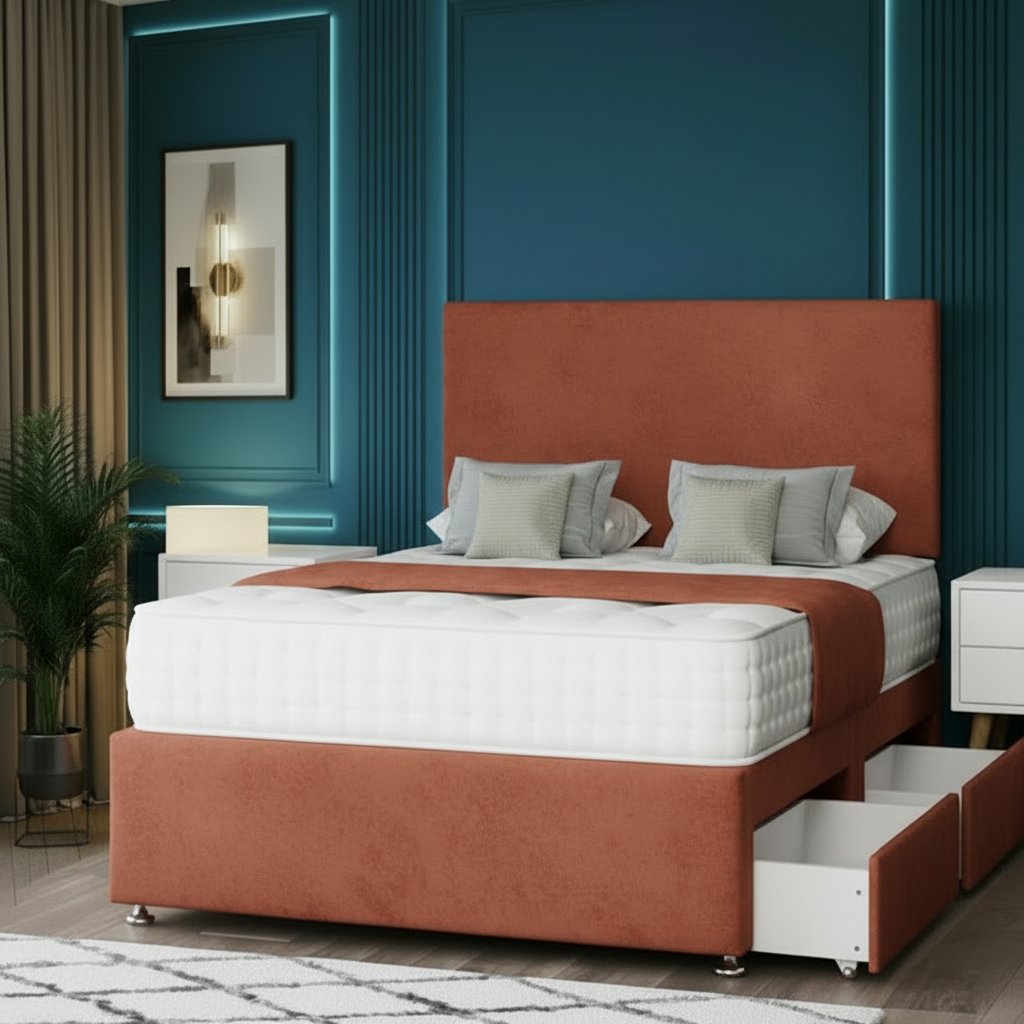 Gray upholstered bed with storage drawers against a blue wall in a modern bedroom setting.