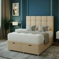 Modern bedroom with a large bed, nightstands, and decorative elements.