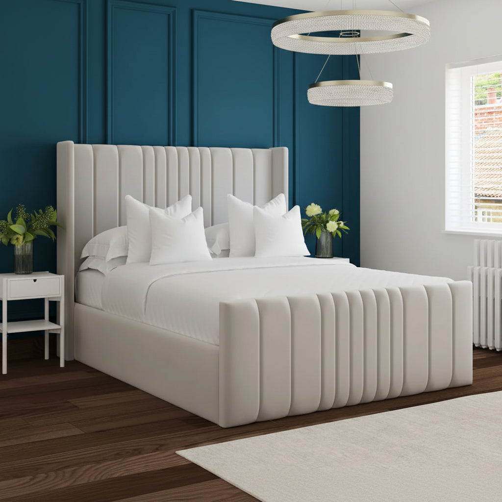 Neatly made bed with white bedding in a bedroom setting.